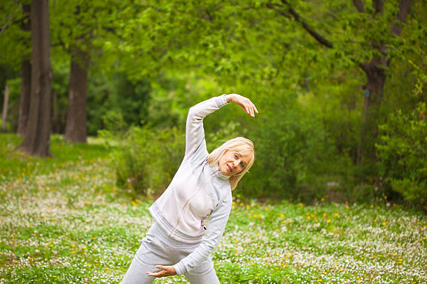 istock Adult woman  exercising 506435063