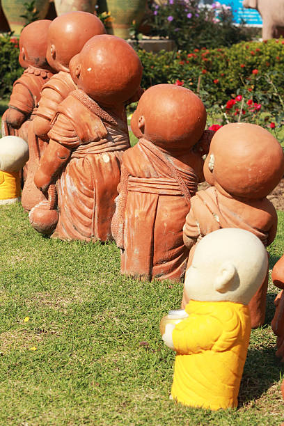 istock novice statue in Thailand temple 506435633