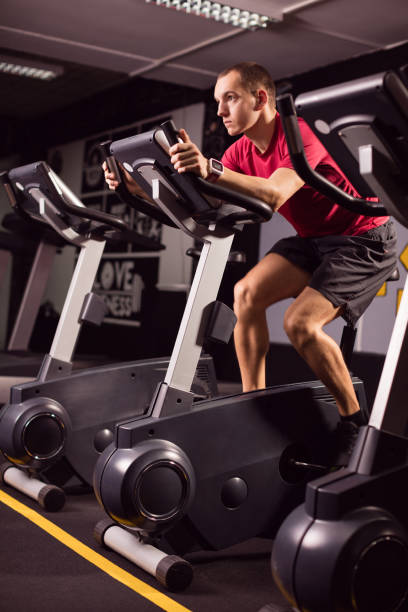 Young man exercising in the gym