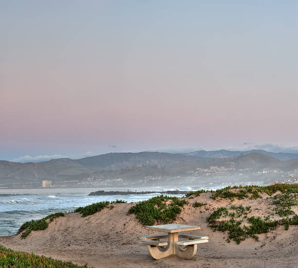 istock Lone picnic table against the dunes. 506438848