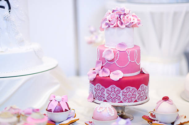istock White wedding cake decorated with sugar flowers 506441144