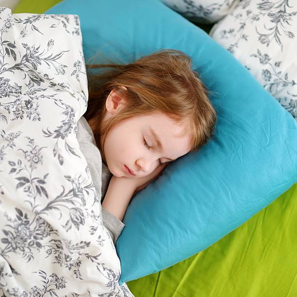 istock Adorable little girl sleeping 506442298