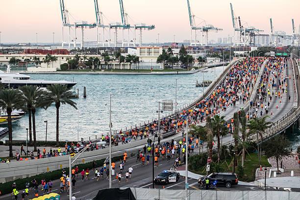 Miami Marathon 2016 Miami, Florida - JANUARY 24th, 2016: Runners in the Miami Marathon on January, 24th, 2016 in Miami, FL. Miami Marathon has been one of the fastest-growing annual marathons, attracting world-class distance runners. miami marathon stock pictures, royalty-free photos & images