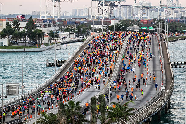 Miami Marathon 2016 Miami, Florida - JANUARY 24th, 2016: Runners in the Miami Marathon on January, 24th, 2016 in Miami, FL. Miami Marathon has been one of the fastest-growing annual marathons, attracting world-class distance runners. miami marathon stock pictures, royalty-free photos & images