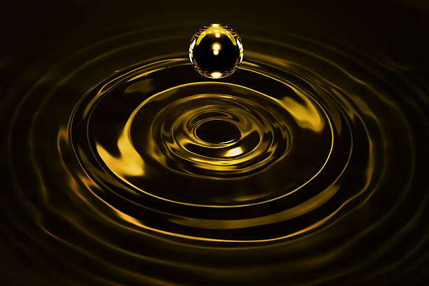 istock Drops of liquid gold 506445076