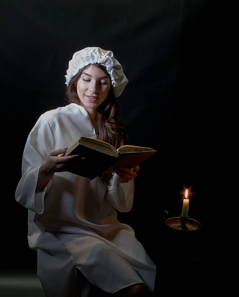 istock Smiling Young Adult Female Reading 506445532