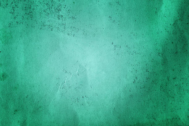 istock Green distressed paper with heavy wear marks 506446838