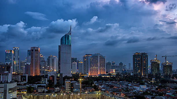 Jakarta city panorama Jakarta city downtown at dusk jakarta skyline stock pictures, royalty-free photos & images