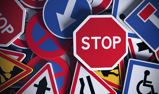 Front view of numerous french traffic road signs. Concept image for background