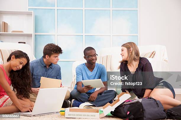 Teenagers Share Social Media Study With Digital Tablet Laptop Home Stock Photo - Download Image Now
