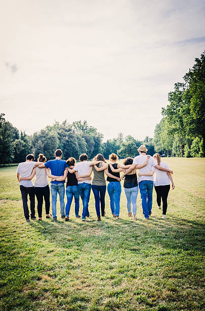 istock Group Of Friends Walking Together 506466863