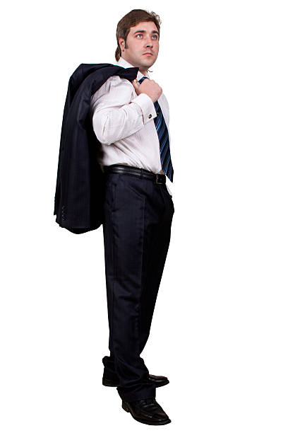 istock businessman with jacket on shoulder and hand in pocket 506467297