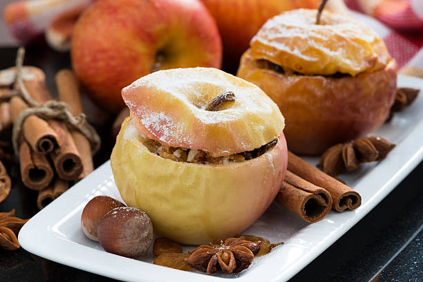 istock baked stuffed apples on a plate 506467853