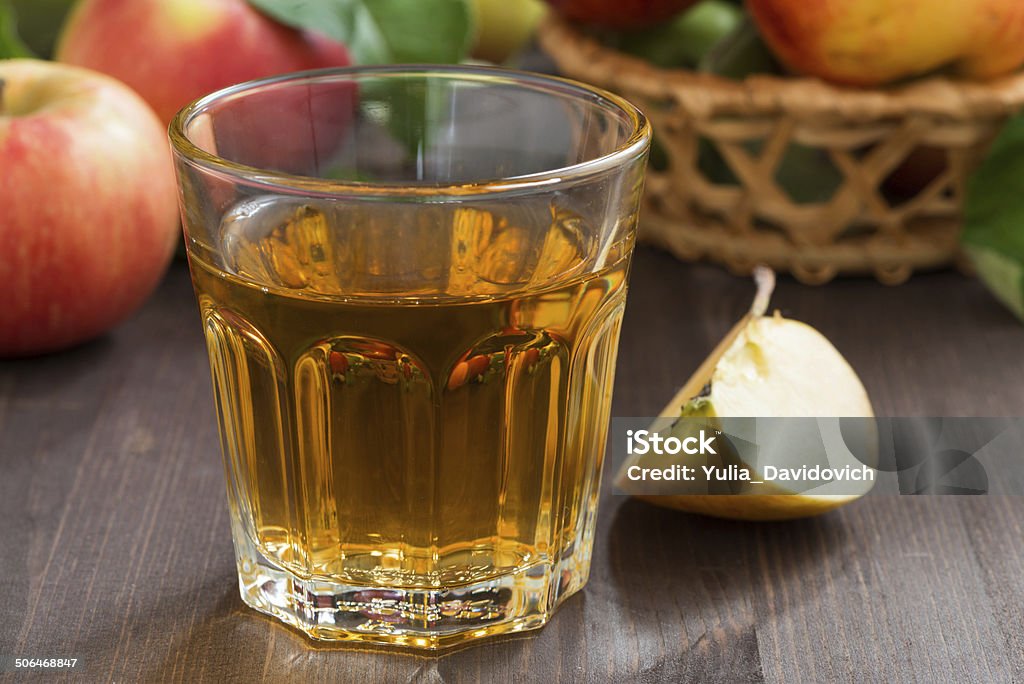 autumn drink - apple cider or juice in a glass autumn drink - apple cider or juice in a glass, horizontal Acid Stock Photo