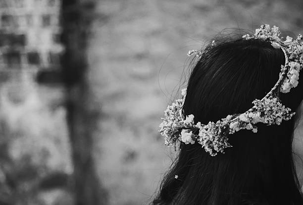 girl with flower crown in black and white