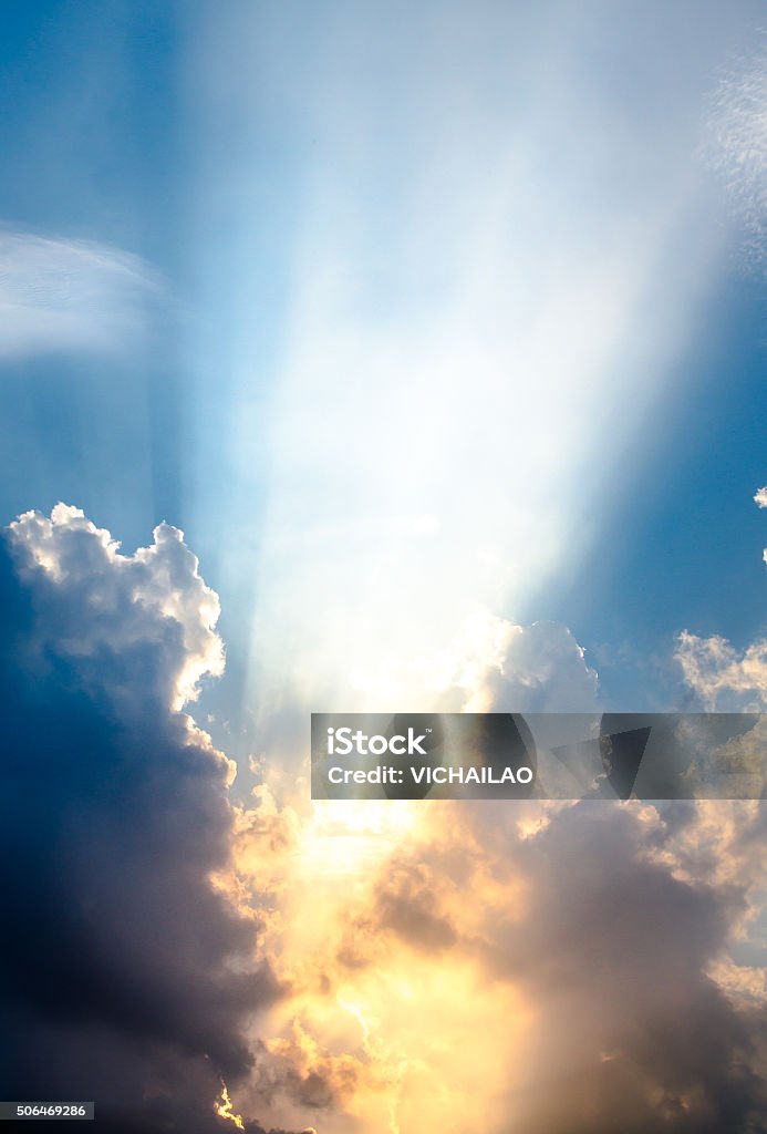 Blue sky and clouds rich in dark clouds, Rays of light Blue sky and clouds rich in dark clouds, Rays of light, Used as background  Cloud - Sky Stock Photo