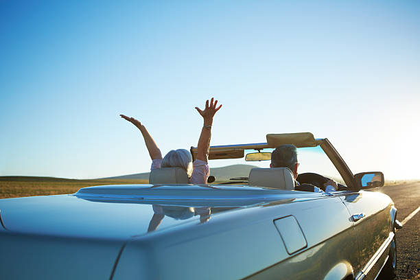 w big blue sky - outdoors car convertible wealth zdjęcia i obrazy z banku zdjęć