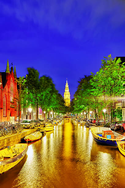 istock Westerkerk (Western Church), with water canal view in Amsterdam. 506469922