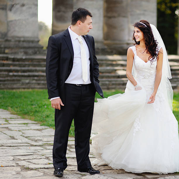 istock Happy newlywed  couple on wedding day 506470825