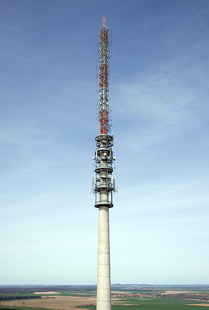 istock Telecommunication antenna tower with the blue sky 506471018