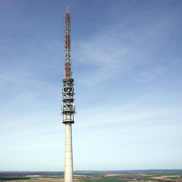 istock Telecommunication antenna tower with the blue sky 506471176