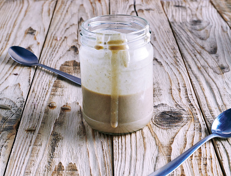 Homemade tahini sauce - sauce made from sesame seeds and oil. The main ingredient of humus