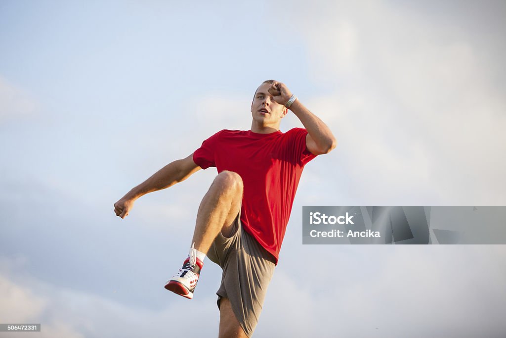 Running fitness man Running fitness man sprinting outdoors Active Lifestyle Stock Photo