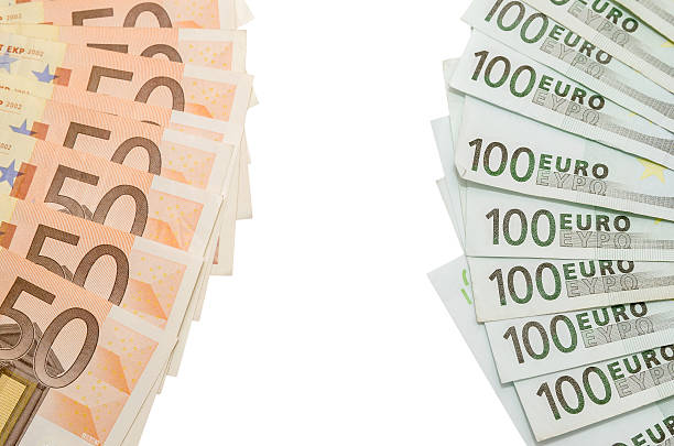 istock 100 euro and 50 euro note isolated 506472450