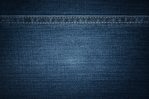 Horizontal jeans texture. Stock photo. Shoot on Sony A7r II (ILCE-7RM2) 42MP.