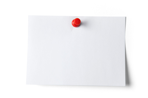 Note paper with red pin, isolated on white. Clipping path included