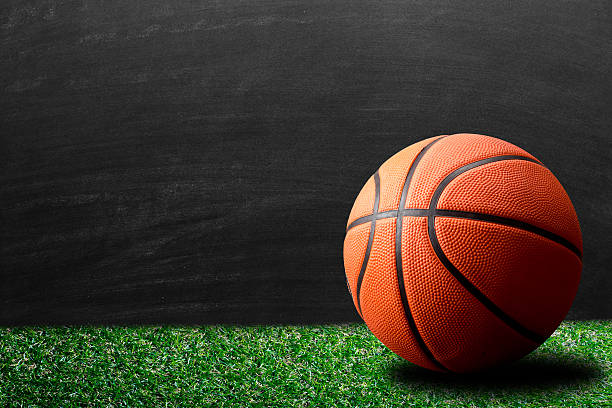 istock Orange basketball against blackboard 506472804