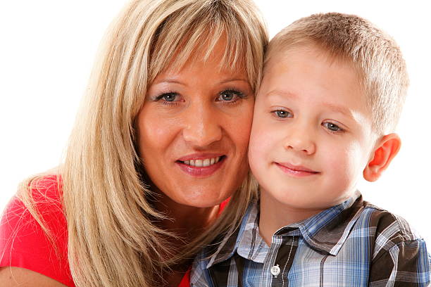 istock mature mother with child 6 years boy isolated 506472905