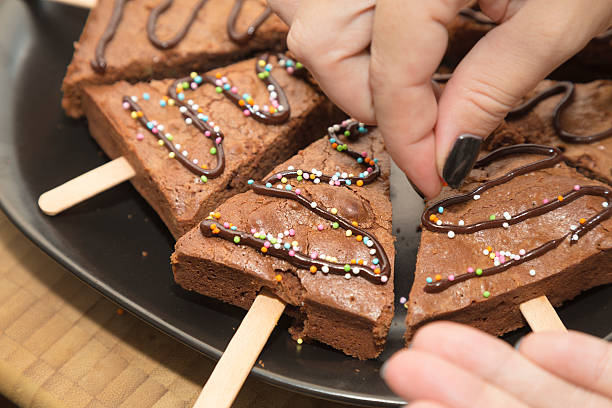 istock Artisan white hands preparing a sweet chocolate cake 506472956