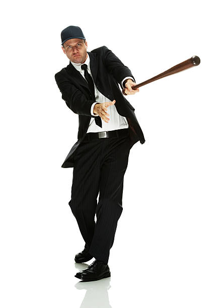 istock Businessman in action with baseball bat 506472981