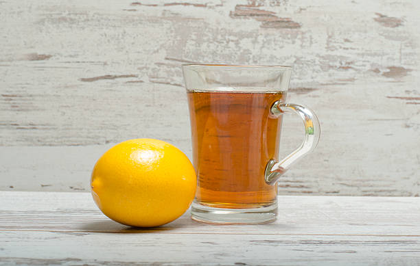 istock Cup of tea on wooden rustic background 506474750