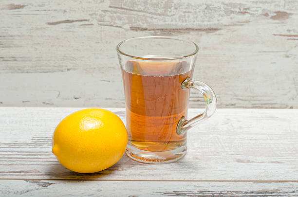 istock Cup of tea on wooden rustic background 506474830