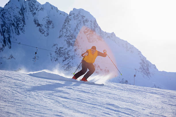 istock Men snow skier skiing on sunny ski resorts 506475086