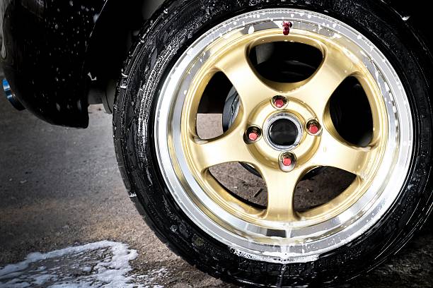 istock car wheel wash 506475544