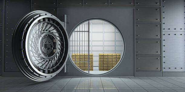 istock Opened huge bank vault full of gold bars front view 506477208