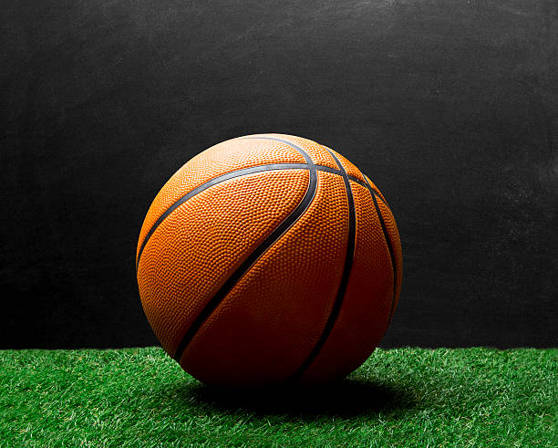 istock Orange basketball against blackboard 506477618