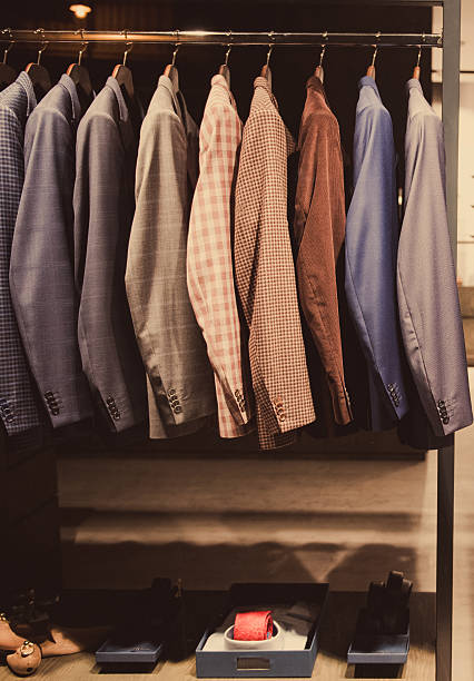 istock Men suits in a fashion store. 506481564