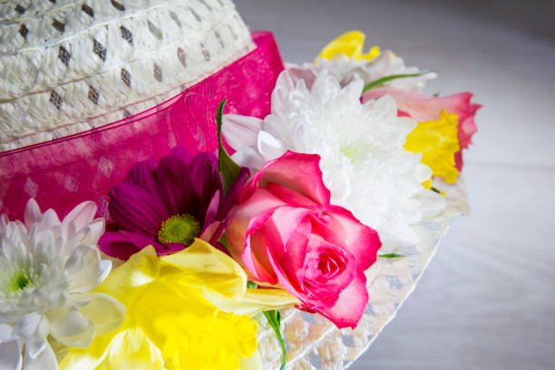 istock Easter Bonnet Made With a Straw Hat and Fresh Daffodils 506483284