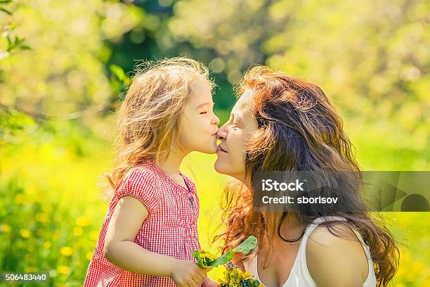 Mother And Daughter In Sunny Park Stock Photo - Download Image Now - Adult, Baby - Human Age, Beautiful People