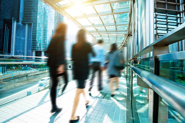 istock People Rushing Through Hong Kong Business District 506484698
