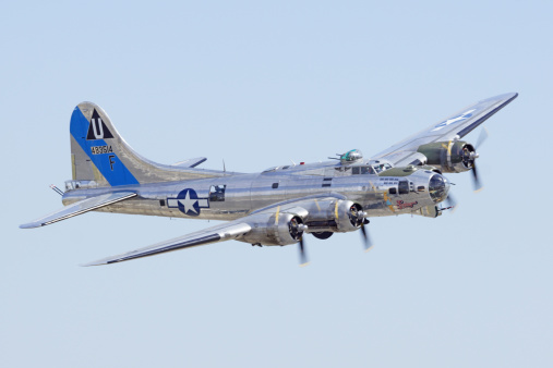 Chino, California, USA- May 4,2014. Planes of Fame Airshow B-17 Flying Fortress vintage WWII aircraft fly-over. The 2014 Planes of Fame Airshow features 2 days of vintage aircraft performing fly-overs and many aircraft static displays.