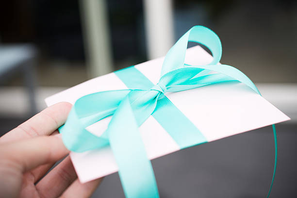 Beautfully wrapped gift - enevelope stock photo