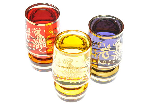 Liquor in glasses isolated on white backgroun