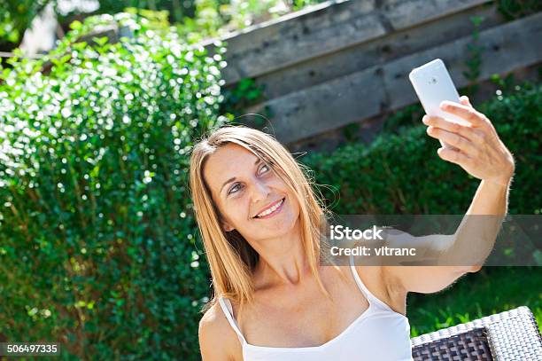 Beautiful Young Woman Taking Selfie In The Park Stock Photo - Download Image Now - 30-39 Years, Adult, Adults Only