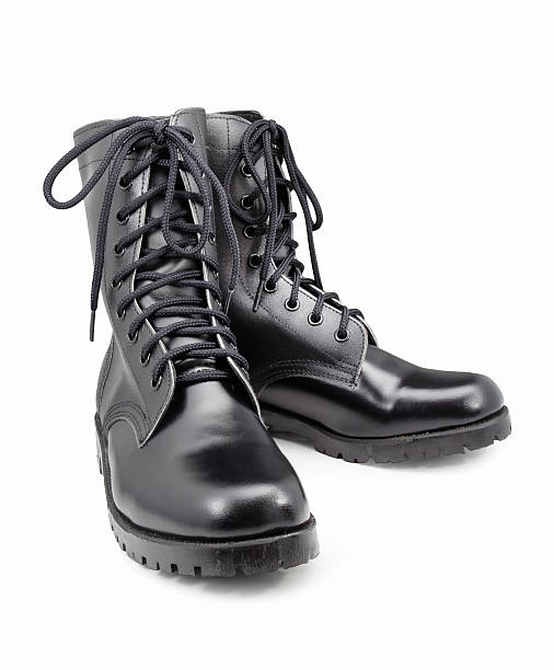 istock black army shoes isolated on white backgrounds 506498457