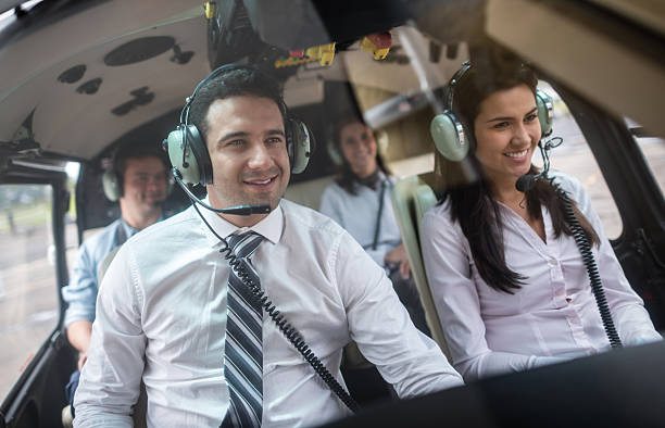 istock People traveling in a helicopter 506498575